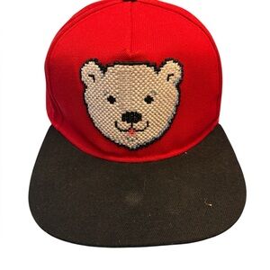 Coca-Cola snapback hat featuring an embroidered polar bear.